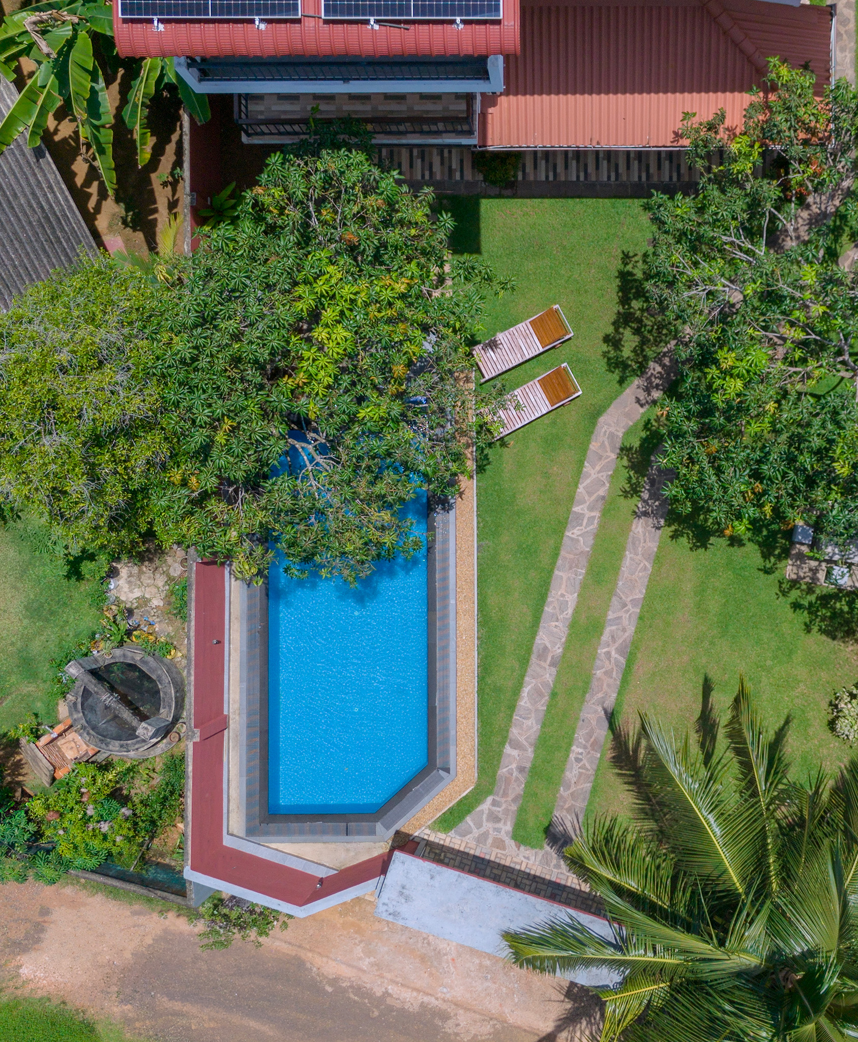 Aerial view of the private pool and tropical garden at Hikka Shells